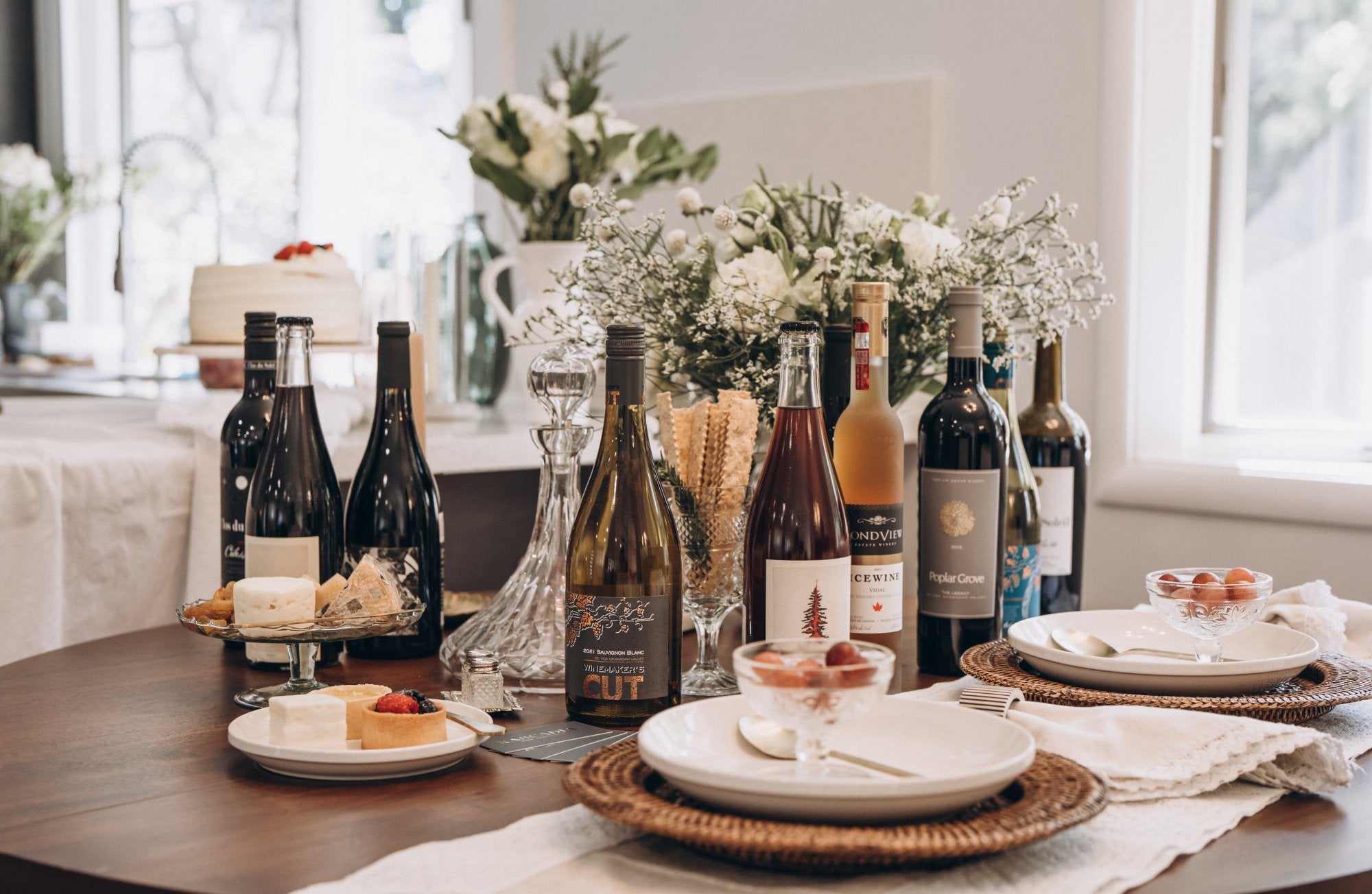 Canadian wine arranged at a warm dinner table